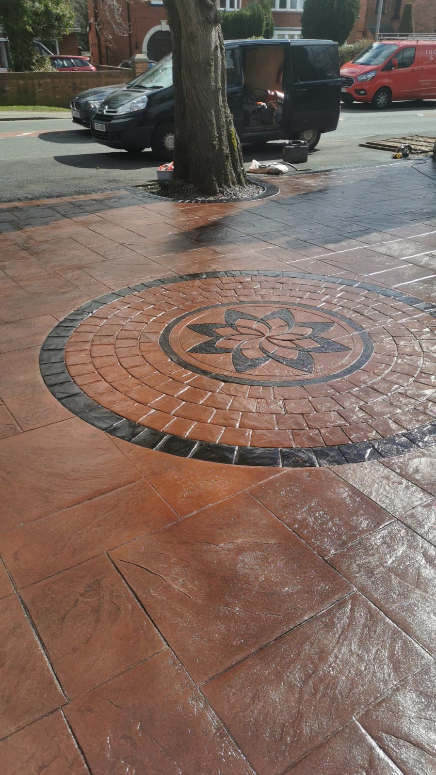 Sandstone coloured imprinted concrete patio and path resealed