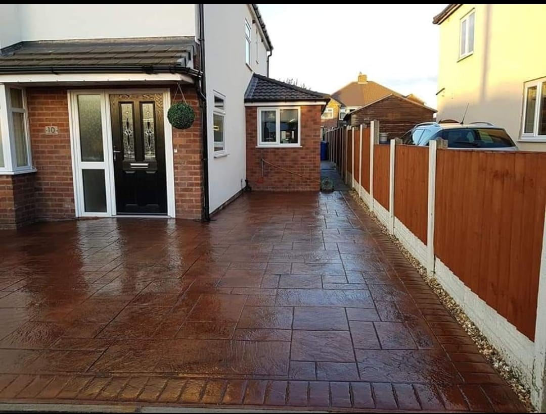 Herringbone brick pattern driveway freshly resealed
